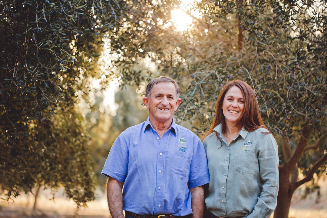 Natasha and Frank DalBon stood in the olive grove at Morella Grove