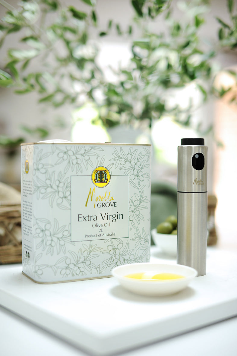 Morella Grove extra virgin olive oil 2L tin with spray bottle on a table